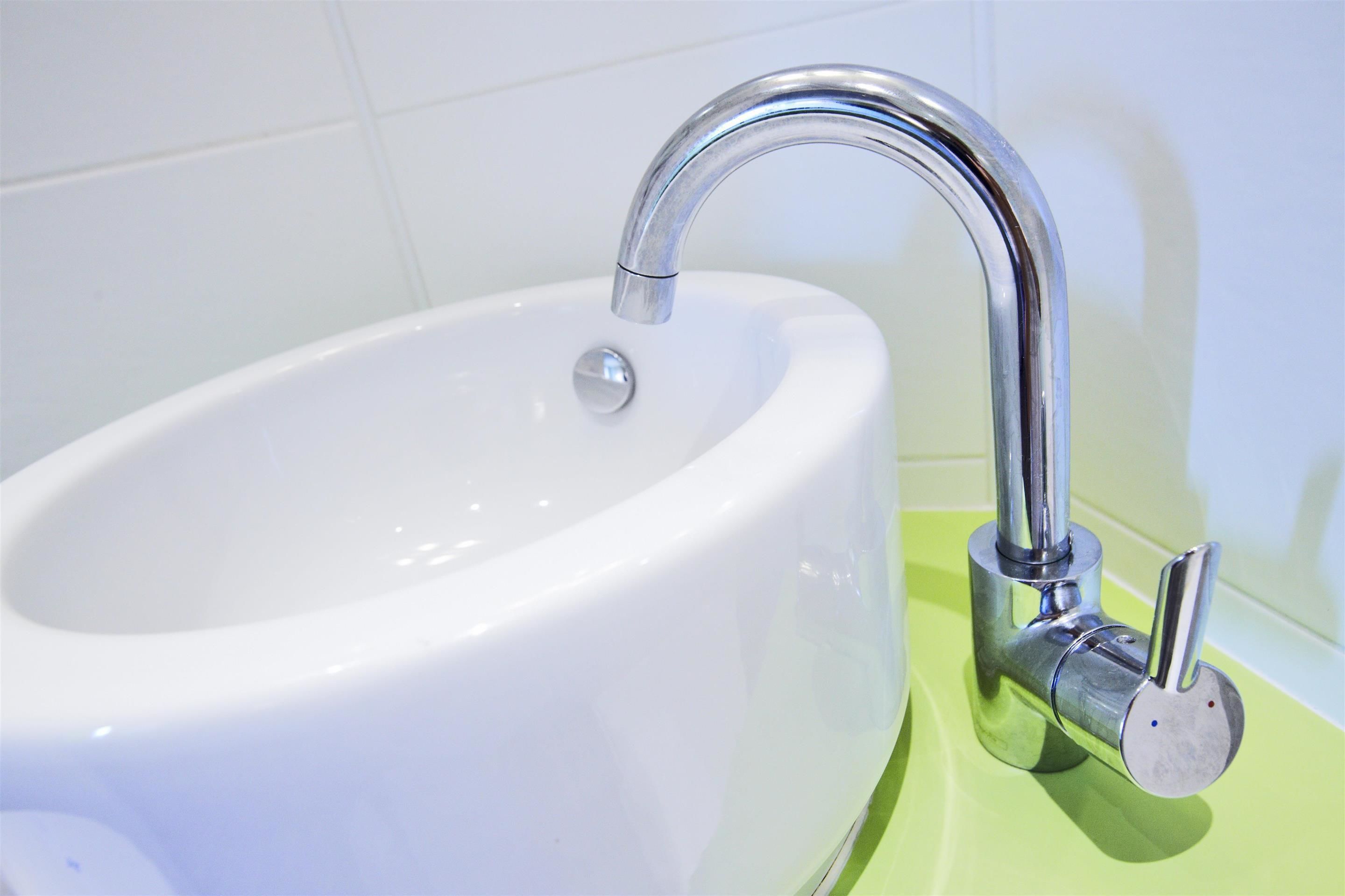 eco-friendly toiletries, hair dryer, towels