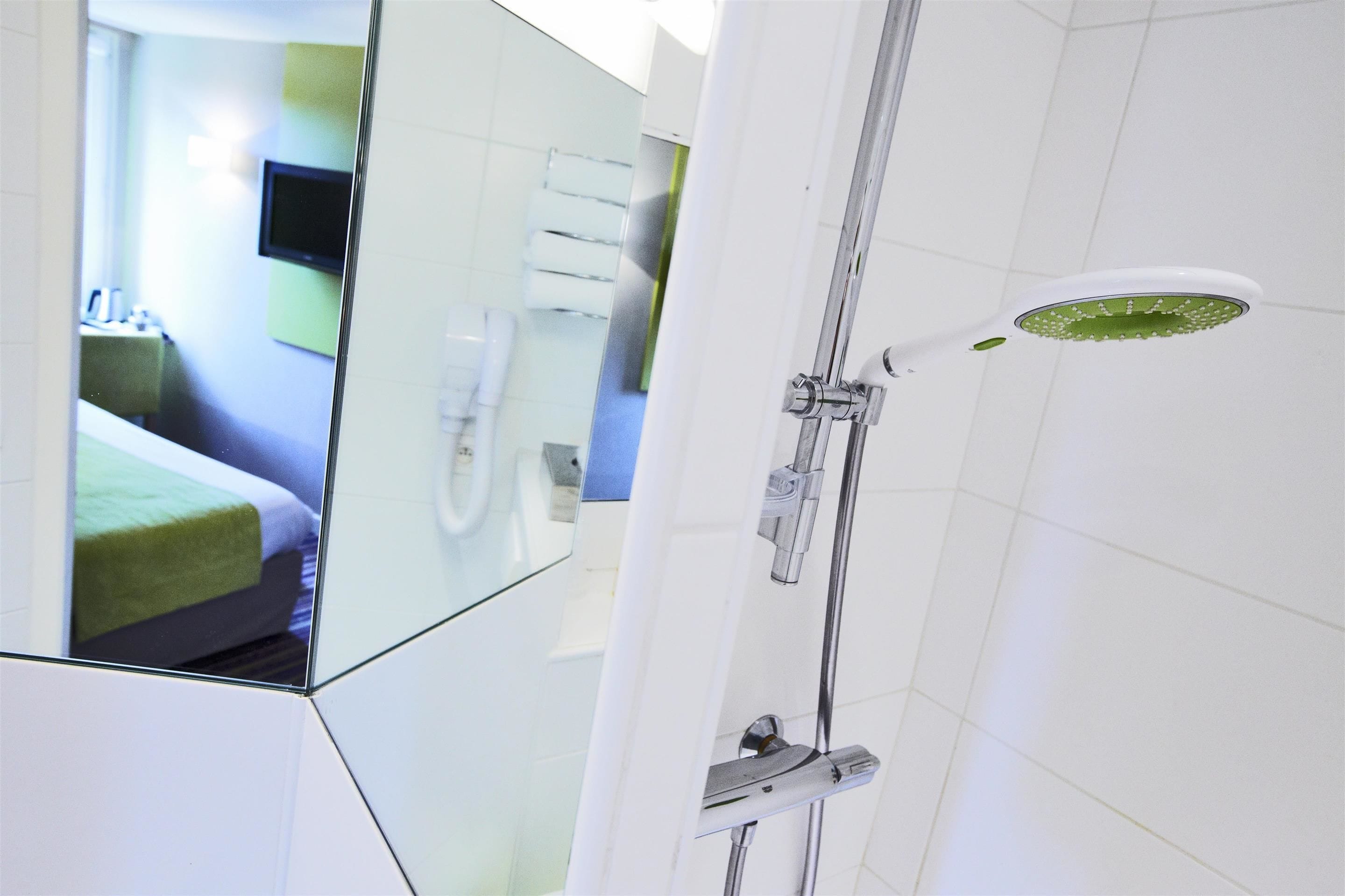 eco-friendly toiletries, hair dryer, towels