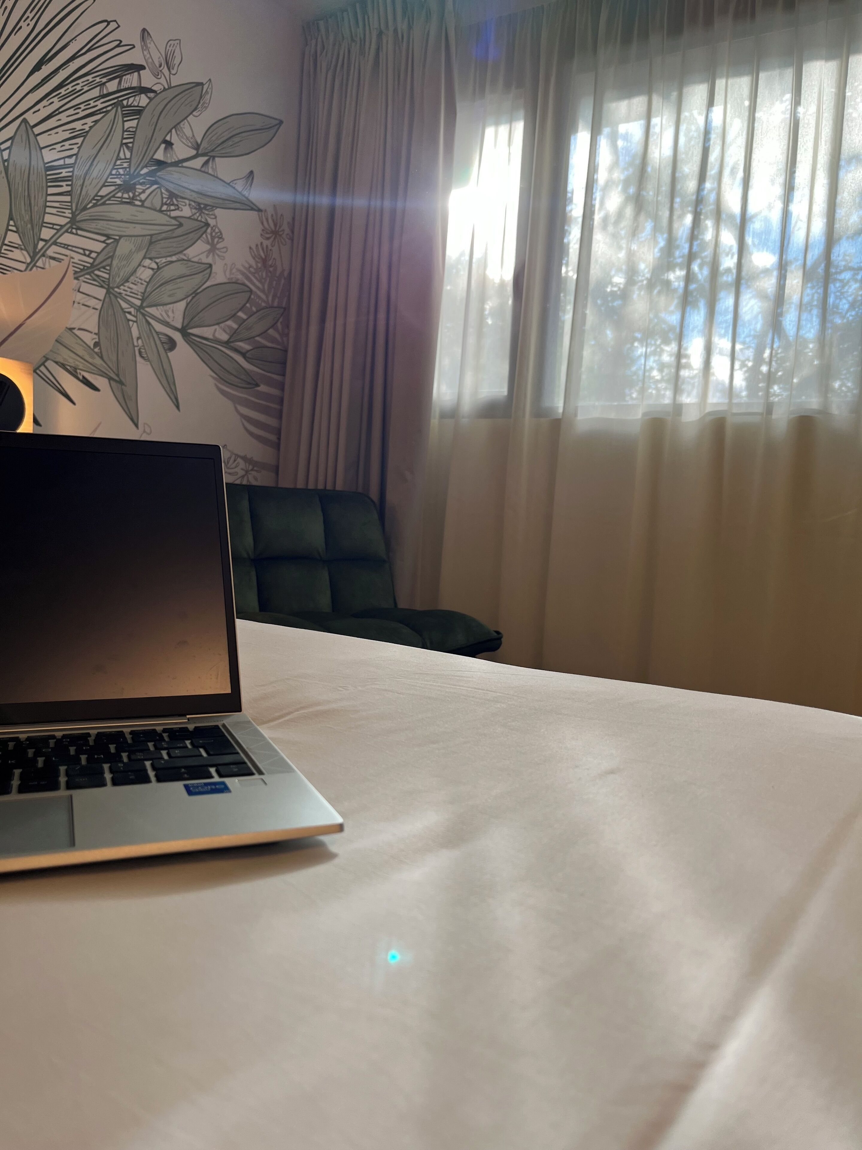 premium bedding, desk, laptop workspace, blackout curtains