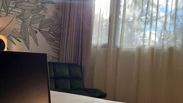 Premium bedding, Select Comfort beds, desk, laptop workspace