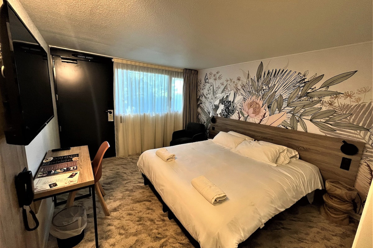 premium bedding, desk, laptop workspace, blackout curtains