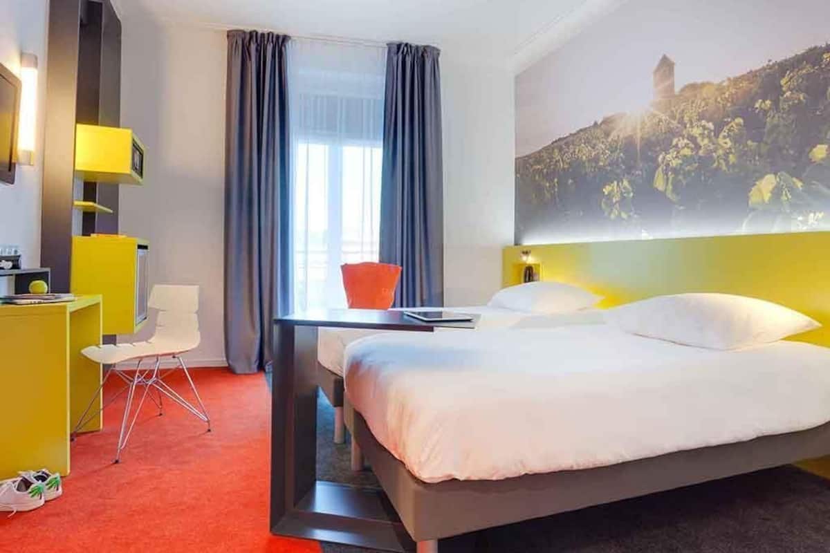 Ropa de cama de alta calidad y minibar