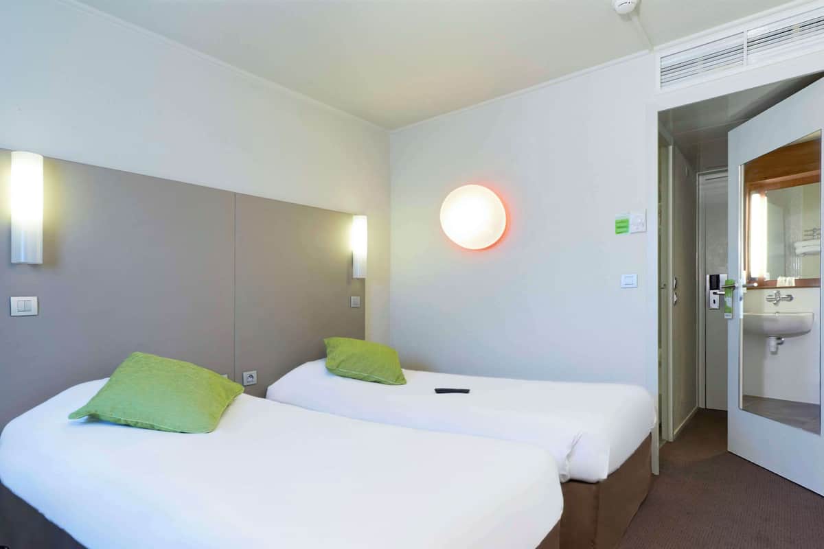 Premium bedding, desk, blackout drapes, iron/ironing board