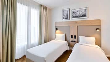 Quarto standard, 2 camas de solteiro | Berços grátis, Wi-Fi de cortesia, roupa de cama, despertadores