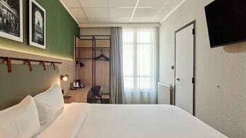Premium bedding, desk, blackout curtains, soundproofing