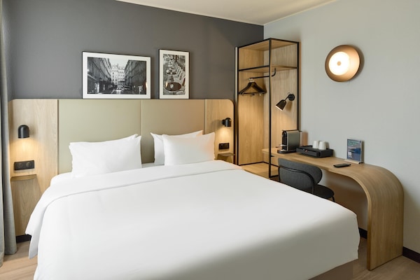 Quarto superior, 1 cama King | Roupas de cama premium, individualmente mobiliados, escrivaninha