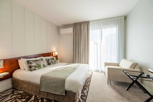 1 habitación, ropa de cama de alta calidad y minibar