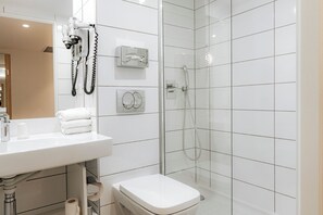 Shower, eco-friendly toiletries, hair dryer, towels