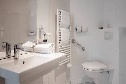 Shower, eco-friendly toiletries, hair dryer, towels