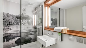 Rainfall showerhead, eco-friendly toiletries, hair dryer, towels