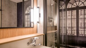 Bathtub, eco-friendly toiletries, hair dryer, towels