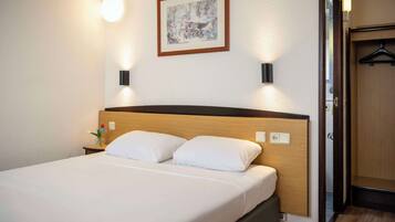 Desk, soundproofing, iron/ironing board, free cribs/infant beds