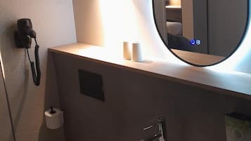 Salle de bain accessible aux personnes à mobilité réduite