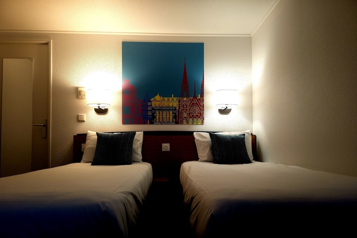 Standaard kamer, 2 eenpersoonsbedden | Luxe beddengoed, een bureau, verduisterende gordijnen