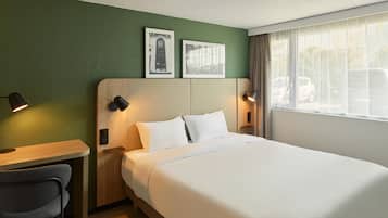 Desk, soundproofing, iron/ironing board, free cribs/infant beds