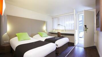 Premium bedding, desk, blackout drapes, iron/ironing board (on request)