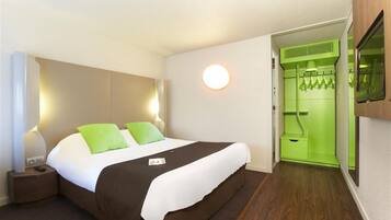 Premium bedding, desk, blackout drapes, iron/ironing board (on request)