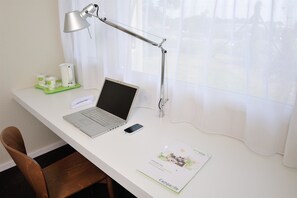 Eco-friendly toiletries, hair dryer, towels