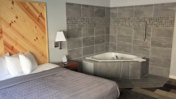 Room, 1 King Bed, Jetted Tub | In-room safe, iron/ironing board, free WiFi, bed sheets