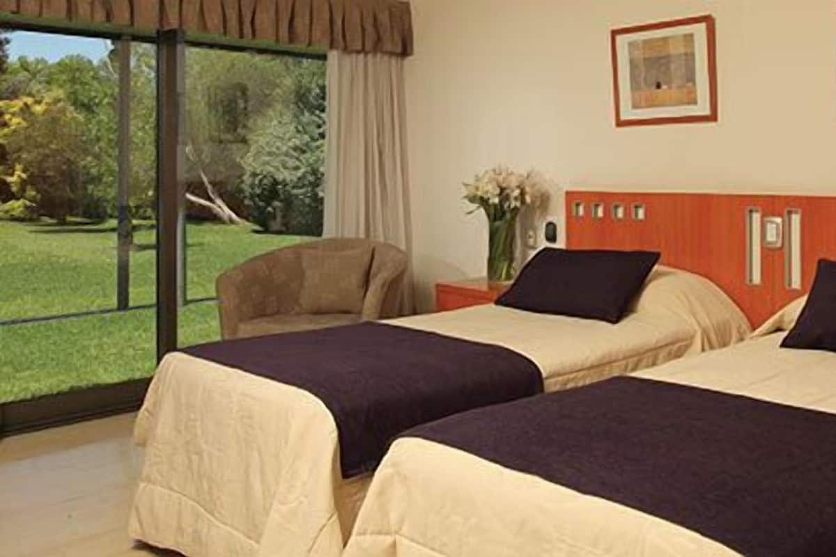 Premium bedding, down comforters, desk, laptop workspace