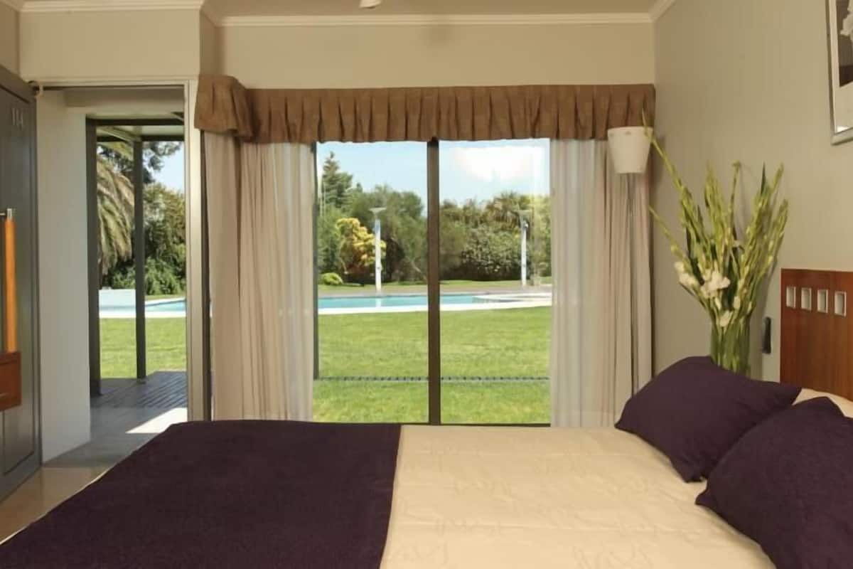 Premium bedding, down comforters, desk, laptop workspace