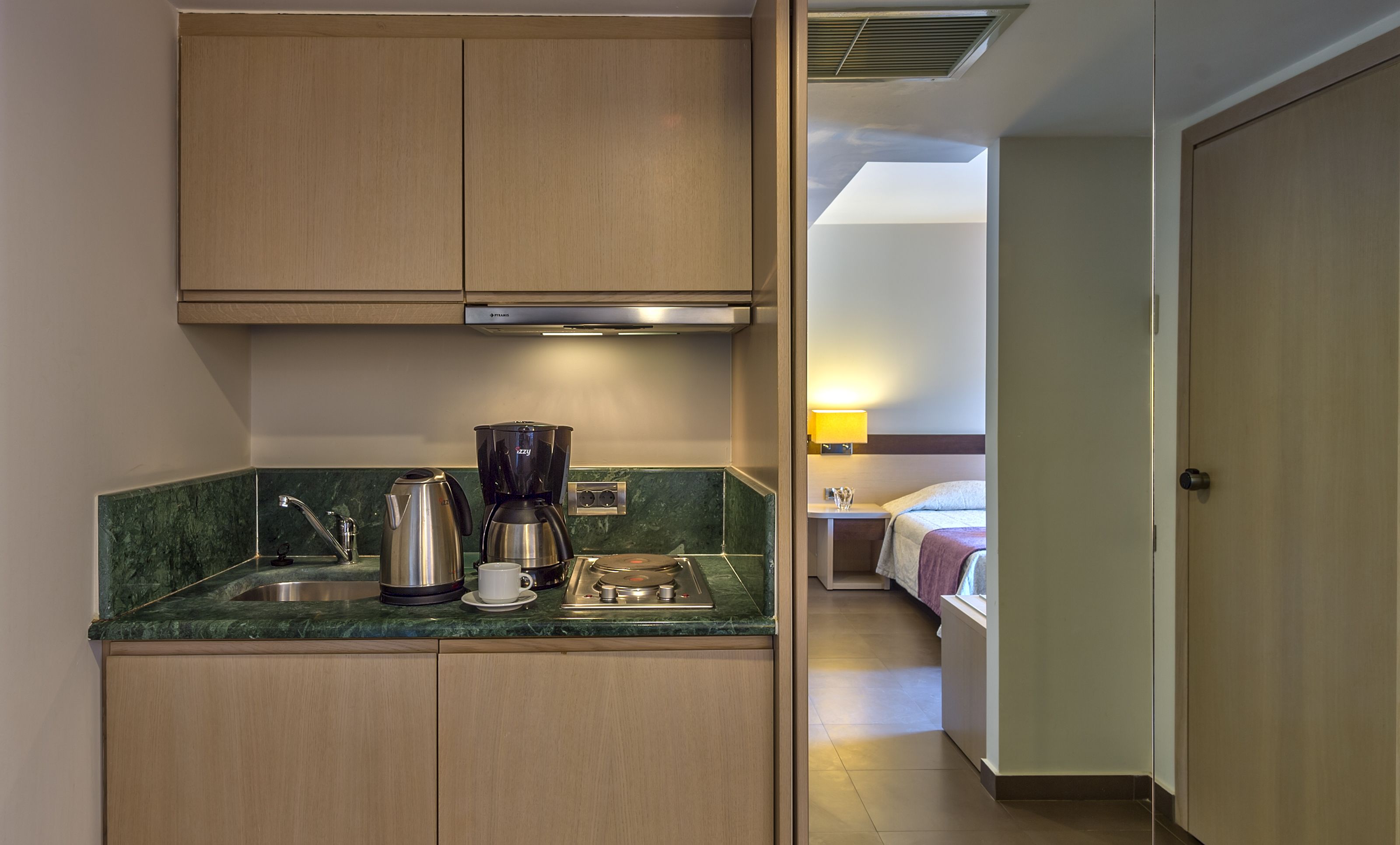 studio with garden or pool view | private kitchenette | electric kettle