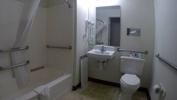 Standard Room, 1 King Bed, Smoking | Bathroom | Free toiletries, hair dryer, towels