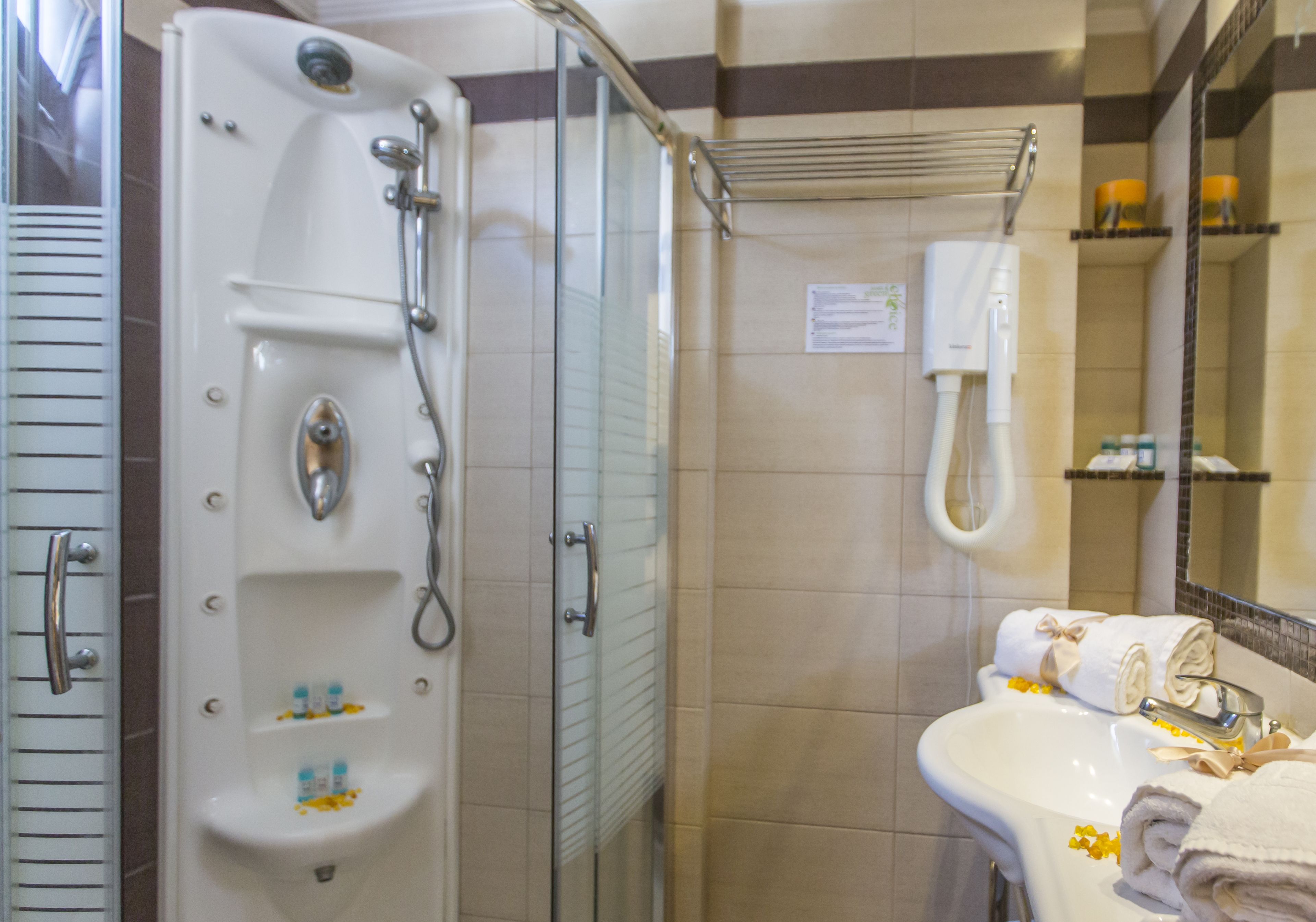 junior suite (building 2) | bathroom | rainfall showerhead, hair dryer, towels