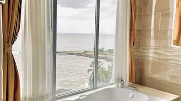 Rainfall showerhead, designer toiletries, hair dryer, towels