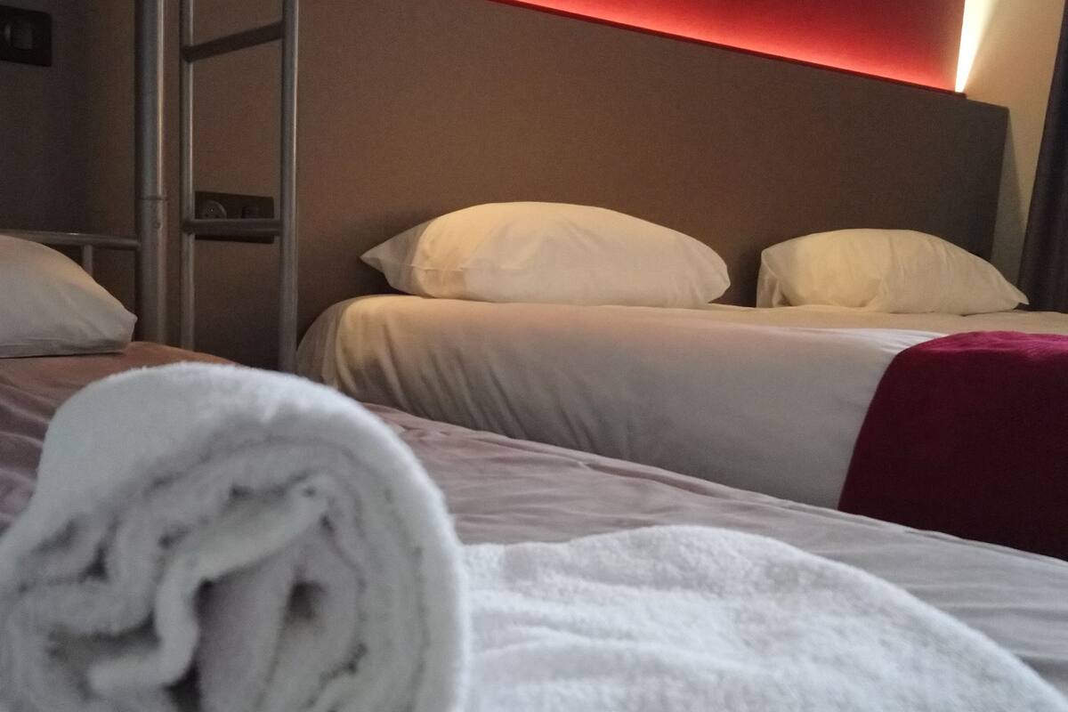 family room | desk, laptop workspace, blackout curtains, soundproofing