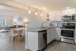 Suite, 2 Bedrooms | Private kitchen | Fridge, microwave, coffee/tea maker, toaster