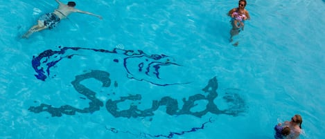 Seasonal outdoor pool, open 10:00 AM to 7:00 PM, pool loungers