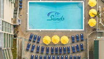 Seasonal outdoor pool, open 10:00 AM to 7:00 PM, pool loungers