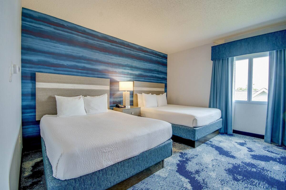 suite north, 2 queen beds  & sofa bed ,no view, no balcony | 1 bedroom, in-room safe, blackout curtains, iron/ironing board