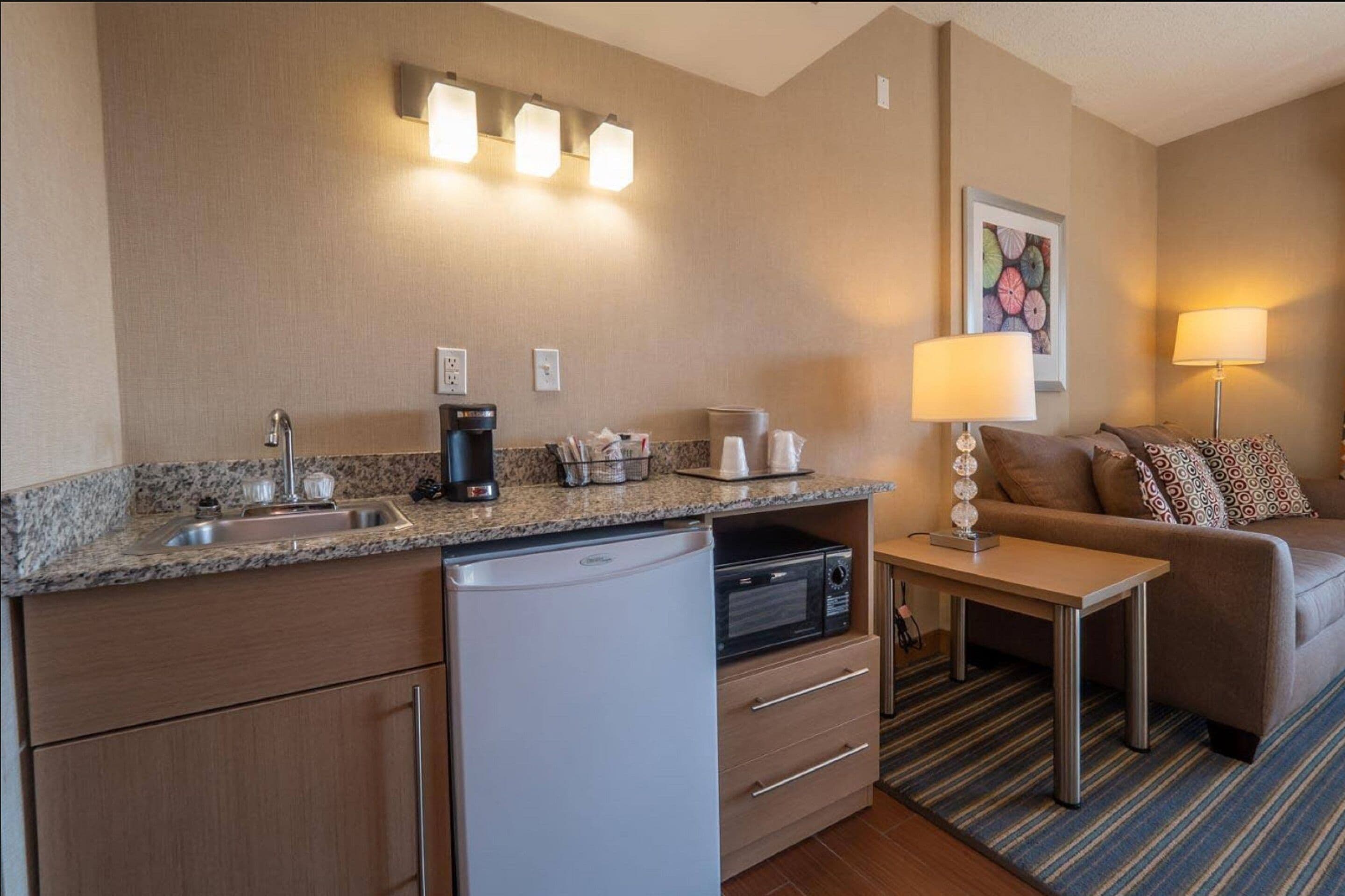 suite, 2 queen beds, balcony | private kitchenette | fridge, microwave, coffee/tea maker