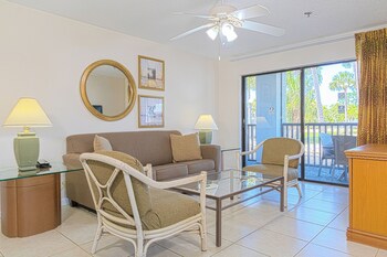 Premium Suite, 2 Bedrooms | Living area | Flat-screen TV, DVD player at Legacy Vacation Resorts Palm Coast