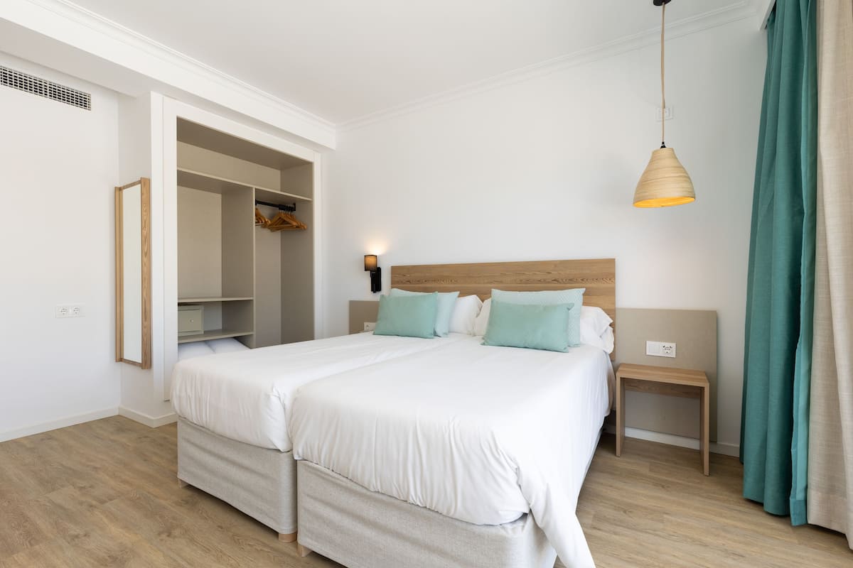 Double Room, Balcony, Pool View | In-room safe, free WiFi, bed sheets