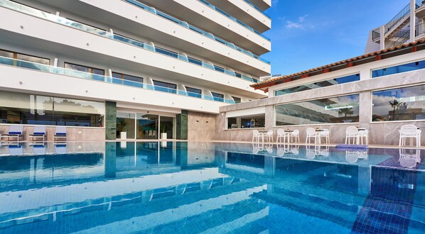 Outdoor pool, pool umbrellas, pool loungers