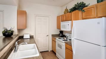 Fridge, microwave, stovetop, cookware/dishes/utensils