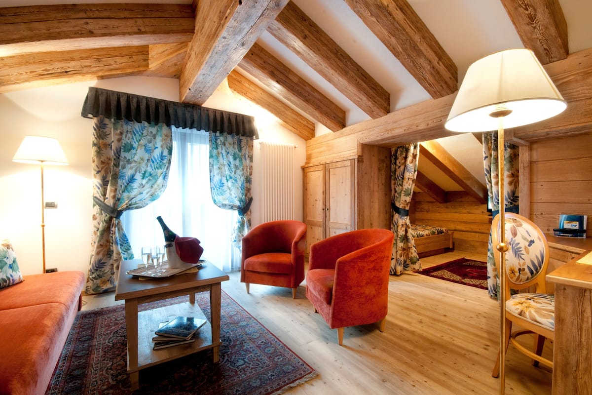 suite | premium bedding, down duvets, memory-foam beds, minibar