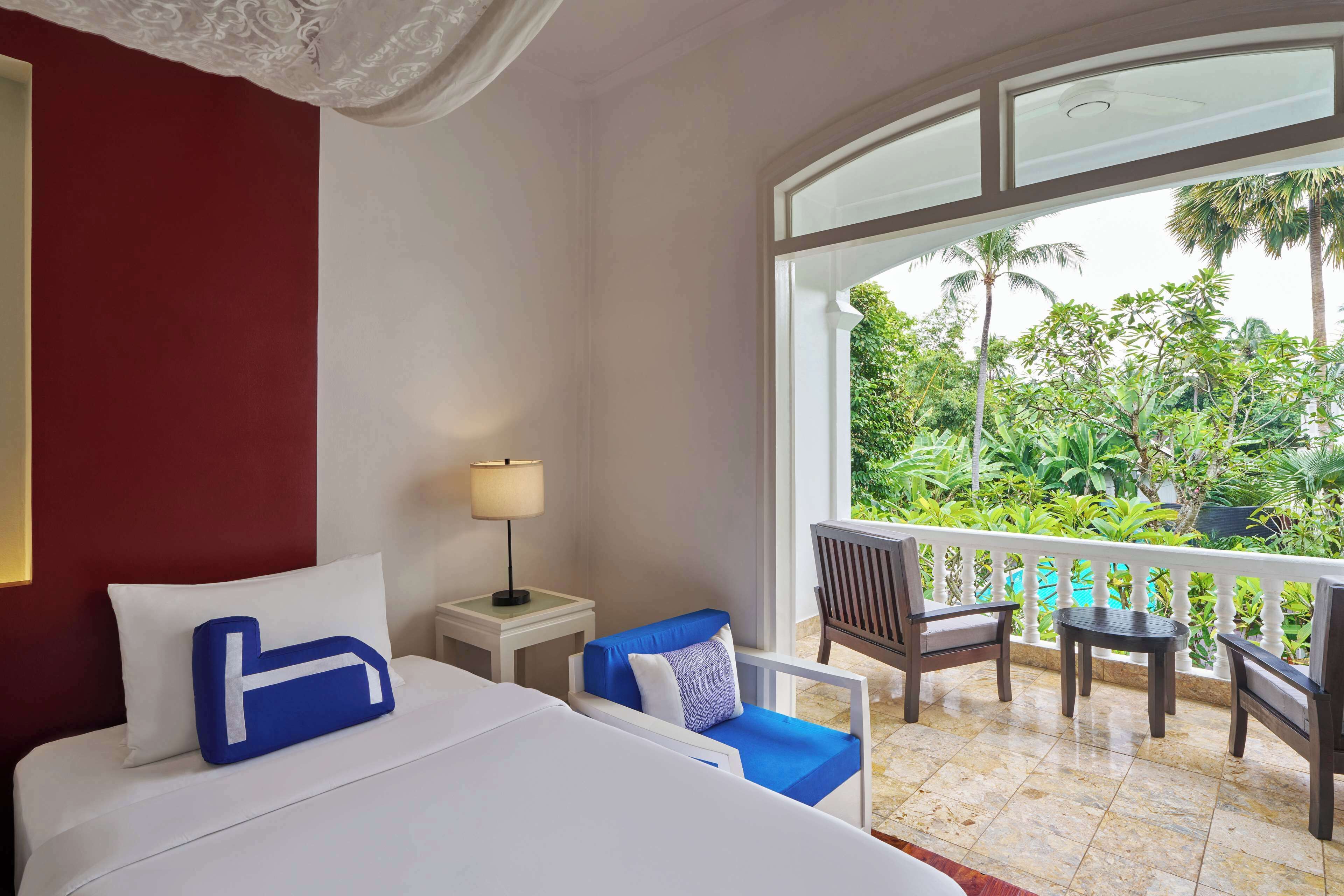 Twin kamer, uitzicht op zwembad (Garden Wing) | Uitzicht vanuit de kamer