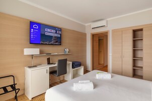 Standard Double Room, Sea View | Down comforters, in-room safe, desk, laptop workspace