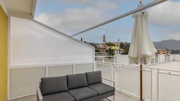 Copriletto in piuma, una cassaforte in camera, una scrivania