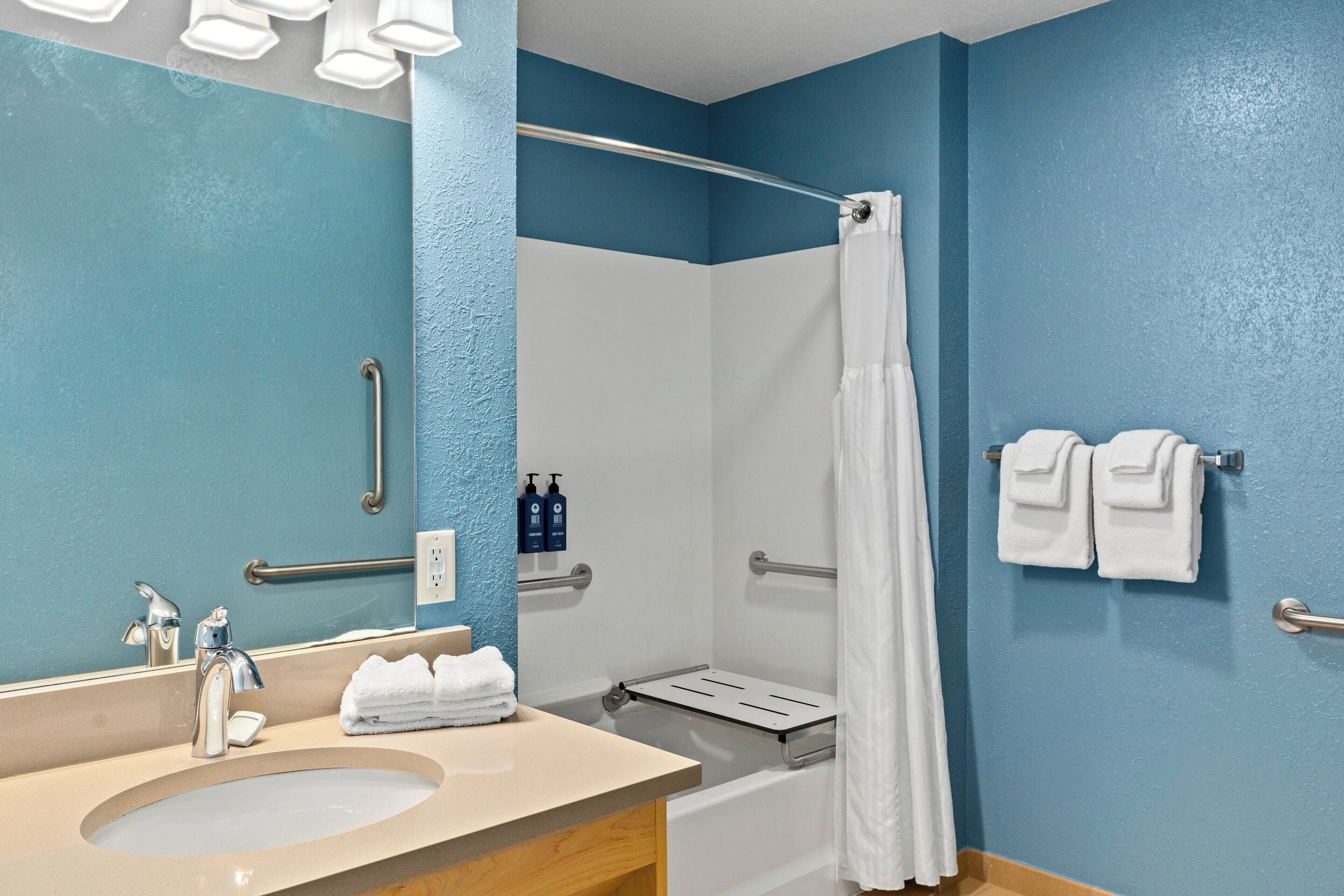 shower, free toiletries, hair dryer, towels