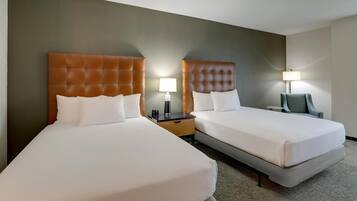 Desk, blackout drapes, iron/ironing board, free cribs/infant beds