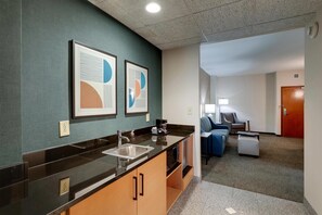 Desk, blackout drapes, iron/ironing board, free cribs/infant beds