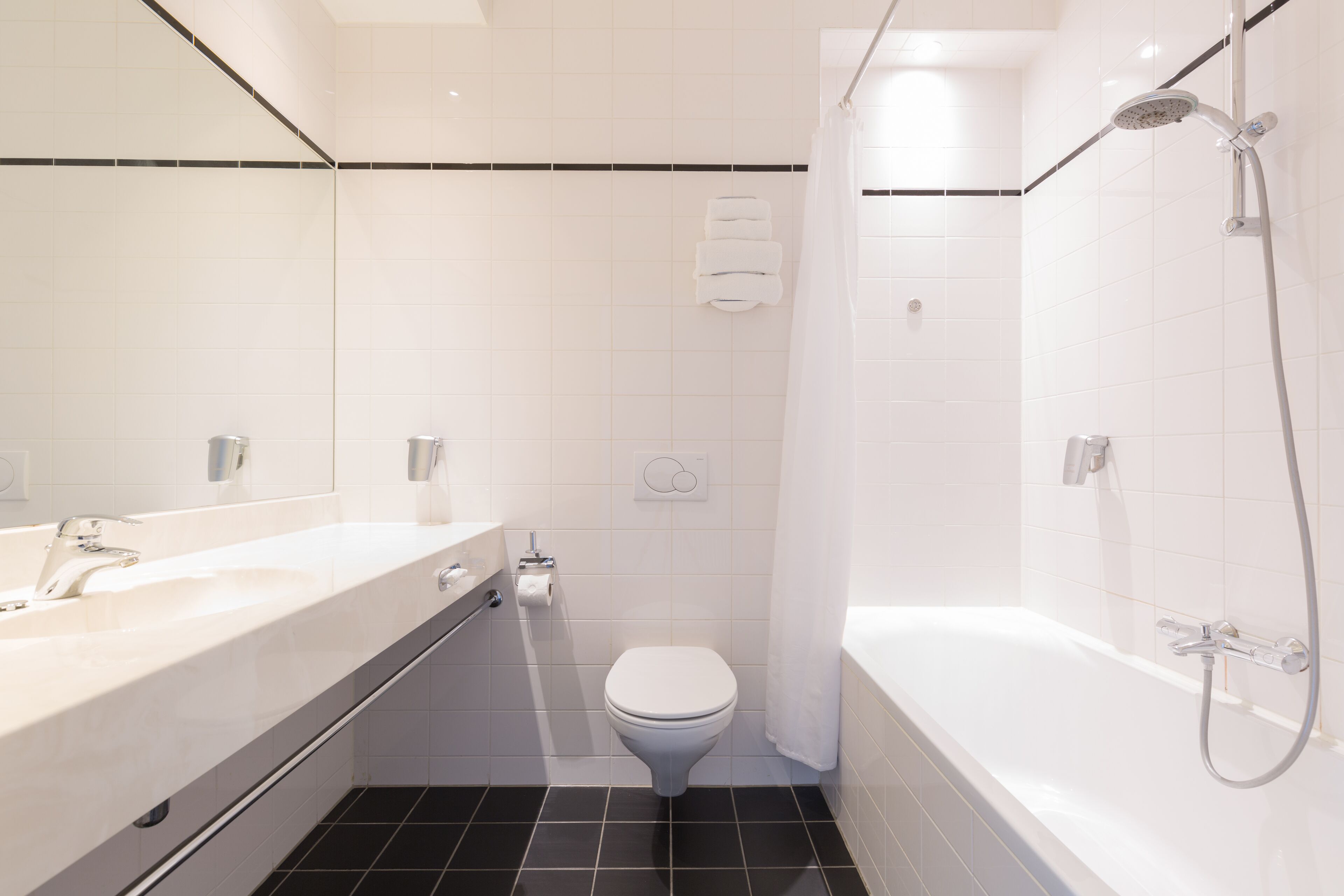 eco-friendly toiletries, hair dryer, towels