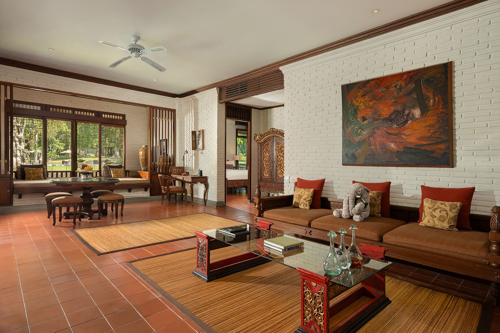 two bedroom family pool villa with club benefits | living area | 32-inch lcd tv with cable channels, tv, dvd player