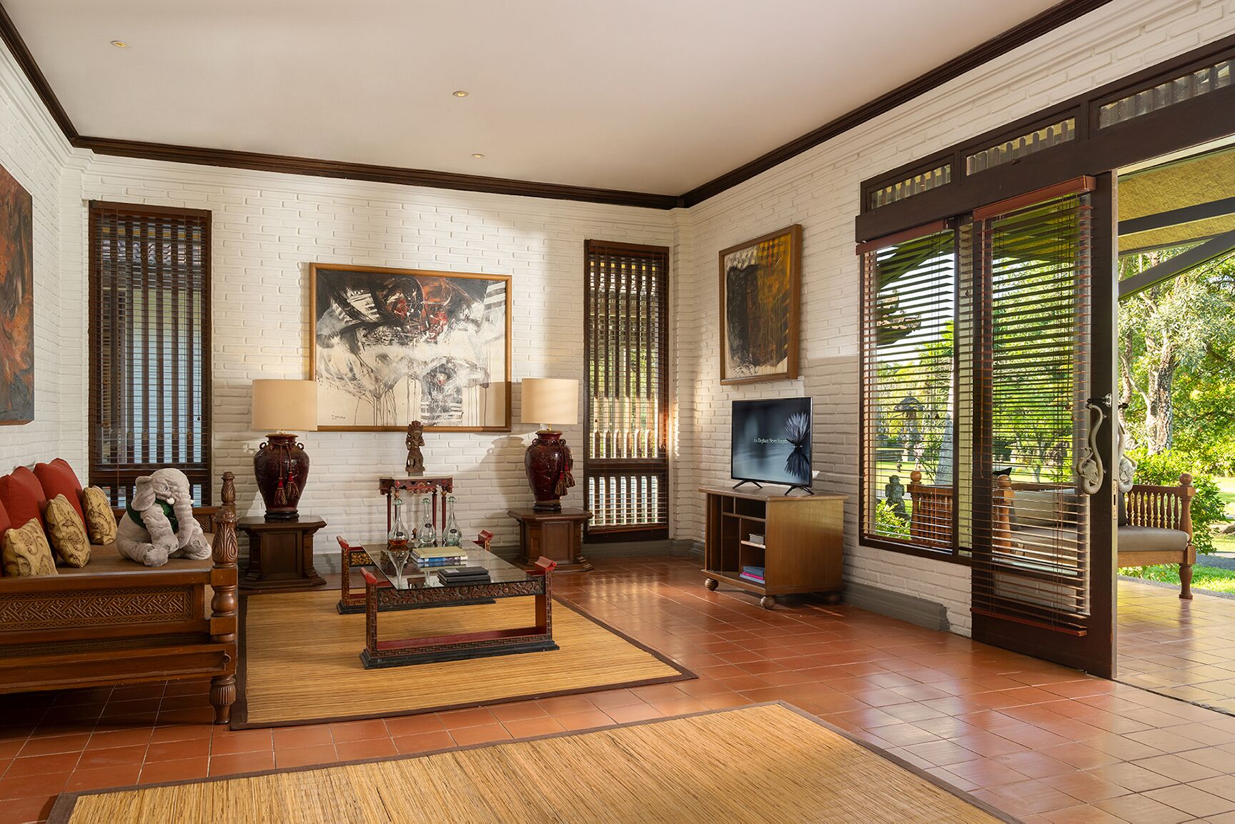 two bedroom family pool villa with club benefits | living area | 32-inch lcd tv with cable channels, tv, dvd player