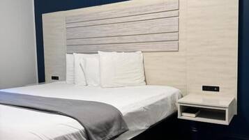 Blackout drapes, iron/ironing board, WiFi (free), alarm clocks